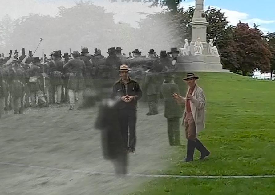 Two photographs that blend into each other at the centerpoint. The left is a black and white lithograph from the Gettysburg address and the right is a modern photo of a man dressed in 1860s era fatigues walking in the same location as the earlier lithograph.